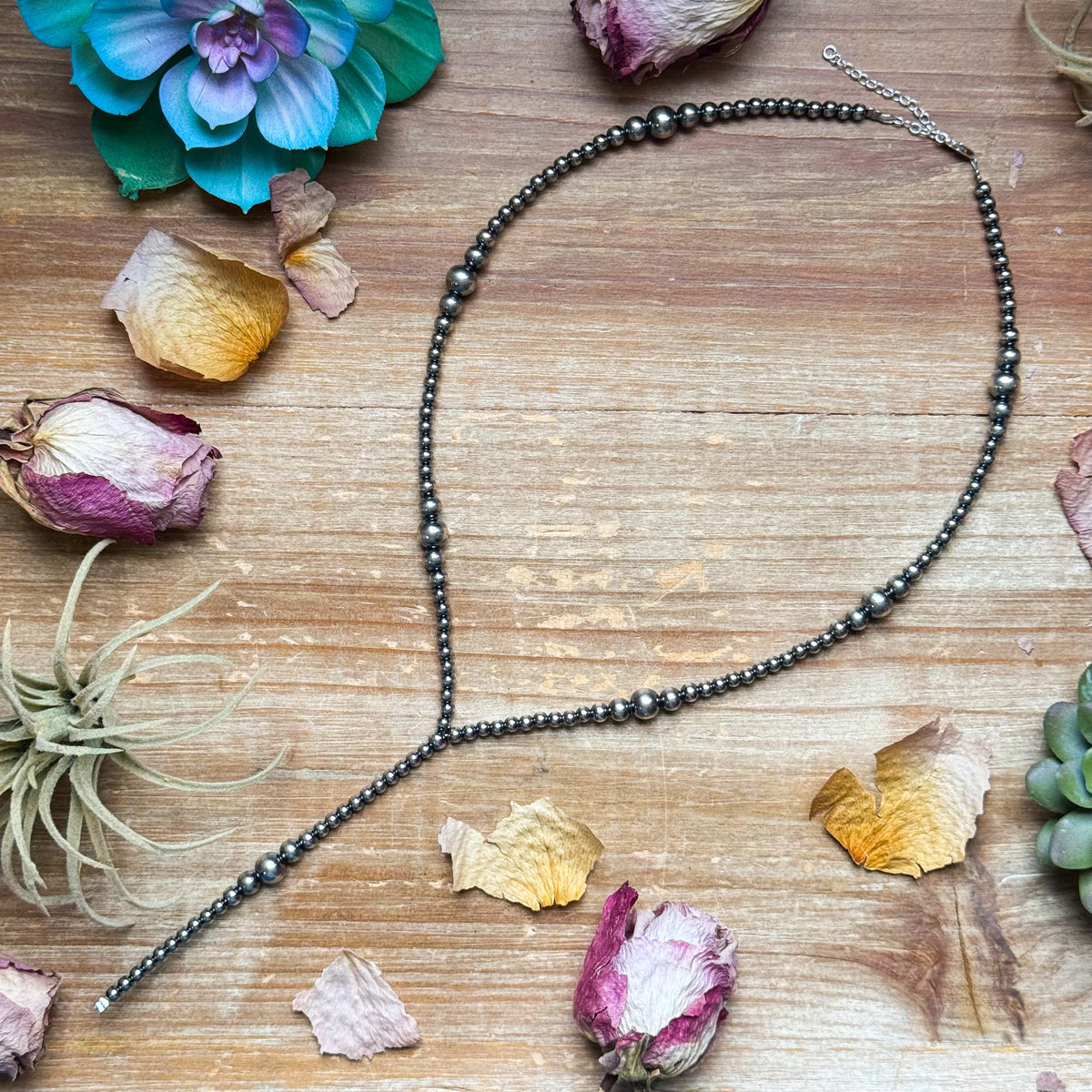 Lariat graduated sterling silver pearl
